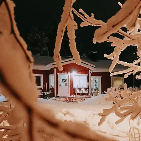 Red Wooden House In Rovaniemi