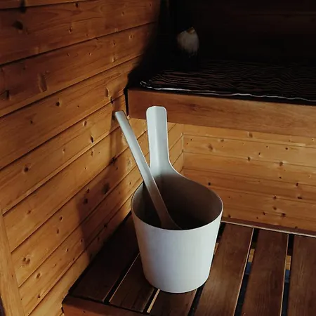 Red Wooden House In Rovaniemi
