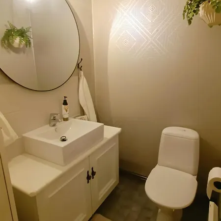 Red Wooden House In Rovaniemi