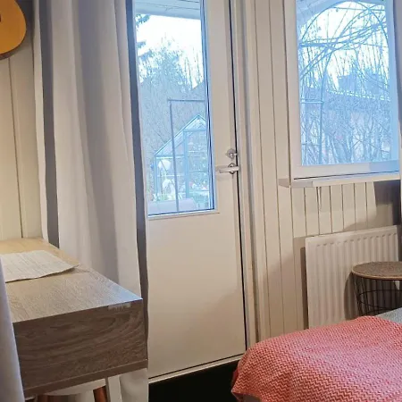 Red Wooden House In ロヴァニエミ