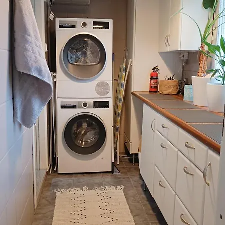 Red Wooden House In * Rovaniemi