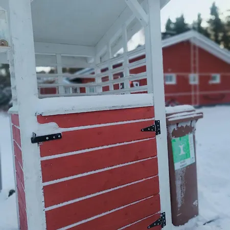 Red Wooden House In