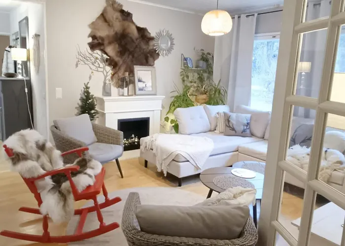 Red Wooden House In Rovaniemi