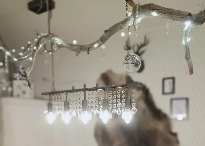 Red Wooden House In Рованиеми