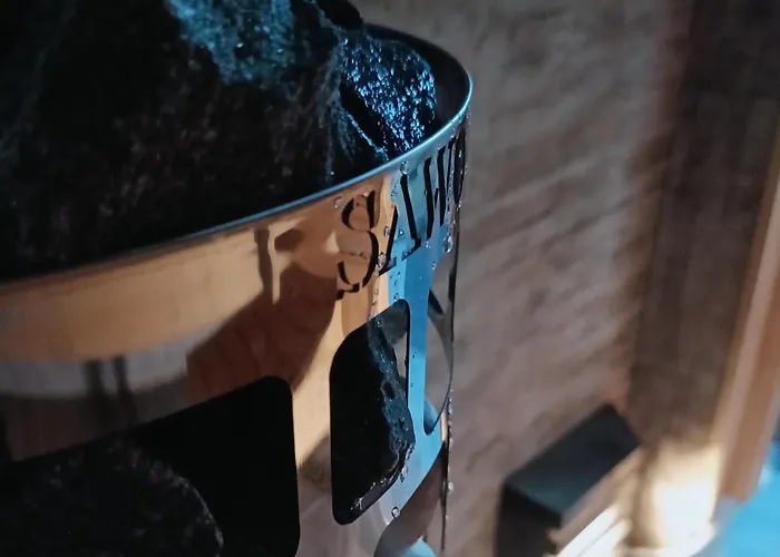 Red Wooden House In Рованиеми