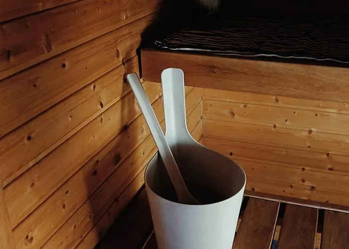 Red Wooden House In Рованиеми