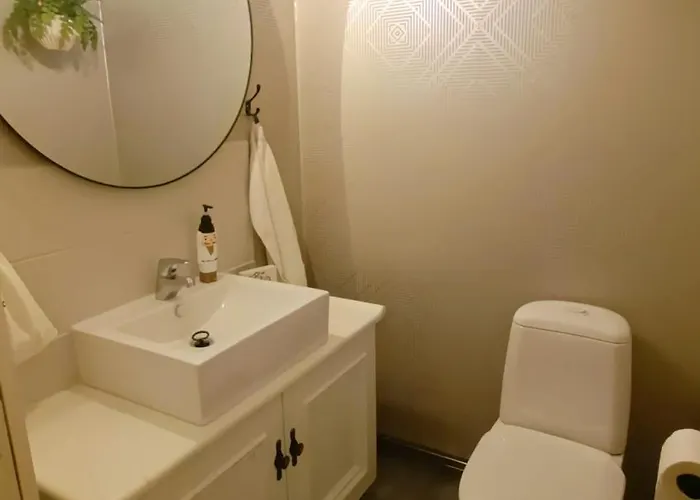 Red Wooden House In Рованиеми