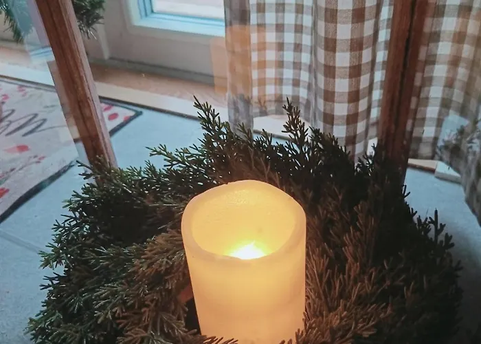 Red Wooden House In Рованиеми