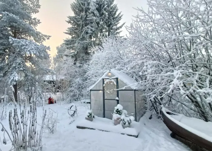 Red Wooden House In * Рованиеми