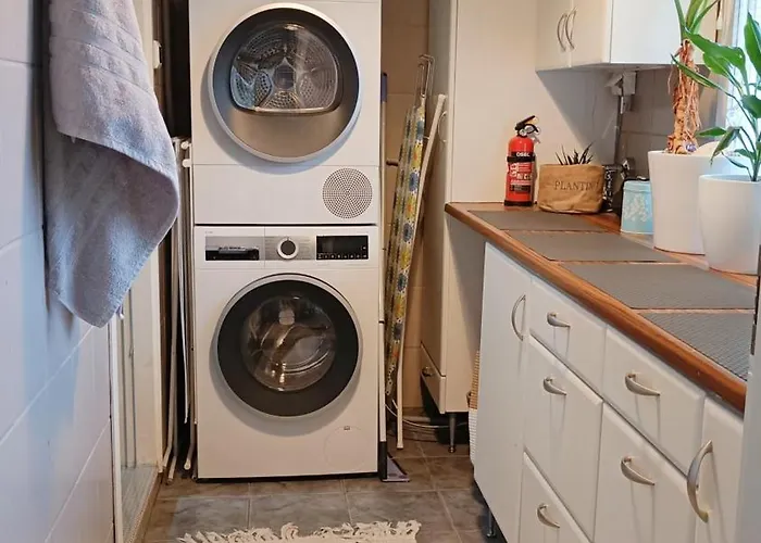 Red Wooden House In * Рованиеми